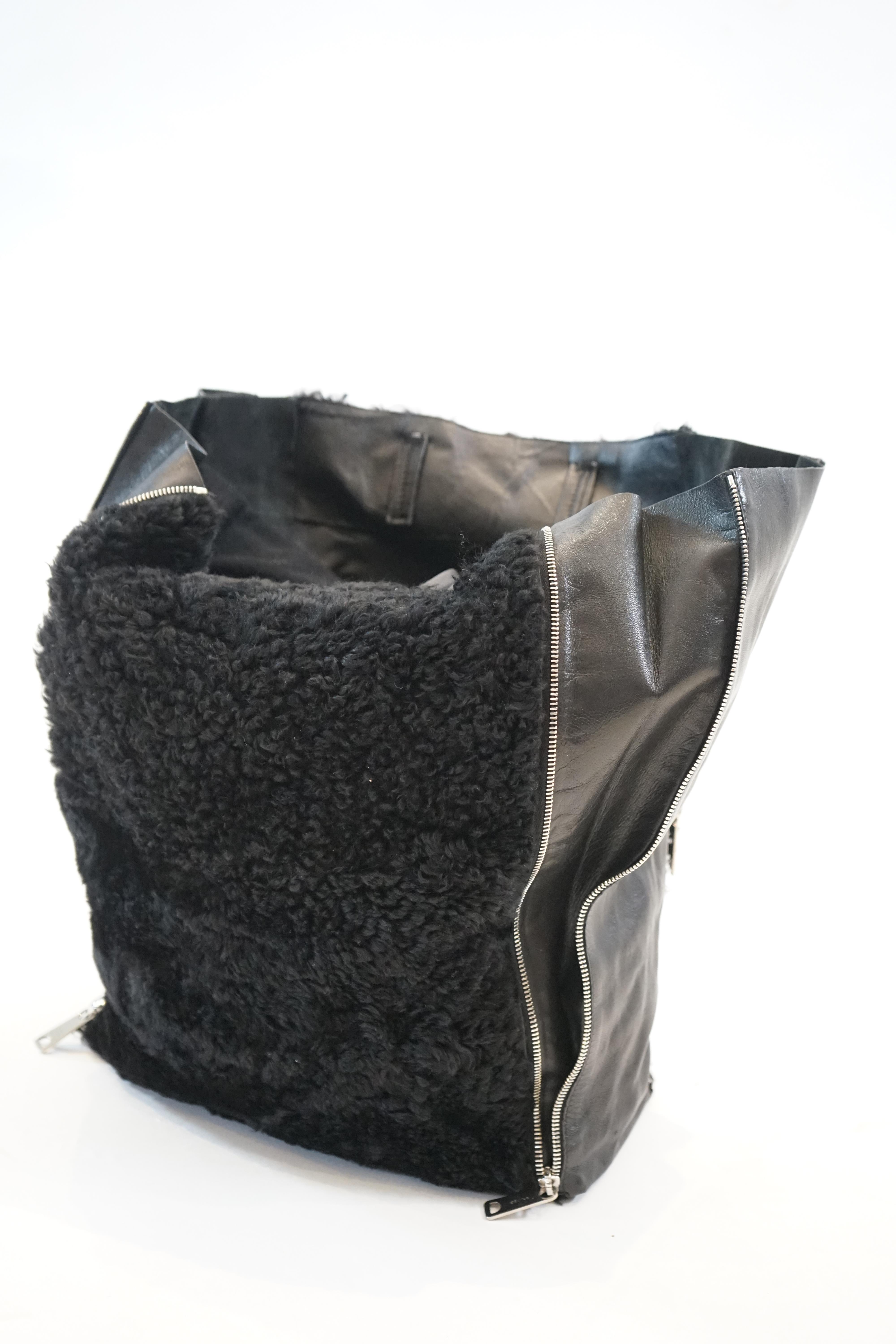 A Celine black shearling and black leather Vertical Gusset Cabas tote bag, Bag width 13cm, length 32cm, height 41cm